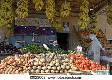 Stock Image - Egypt, Libyan desert, Siwa Oasis, selling fruits and vegetables. Fotosearch