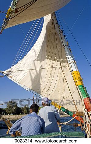 Egypt, near Luxor, aboard a felucca View Large Photo Image Picture - Egypt, near Luxor, aboard a felucca . Fotosearch