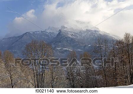 France, Alps, Combloux, mountain landscape in winter View Large Photo Image Stock Image - France, Alps, Combloux, mountain landscape in winter. Fotosearch