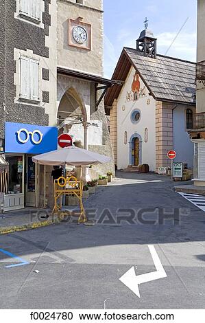 Stock Image - France, Alps, Guillestre, chapel of Saint Sebastian and Notre-Dame d'Aquilon church. Fotosearch