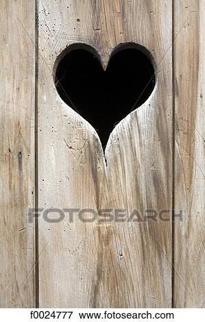 France, Alps, Guillestre, heart sculpted in a door View Large Photo Image Stock Photo - France, Alps, Guillestre, heart sculpted in a door. Fotosearch