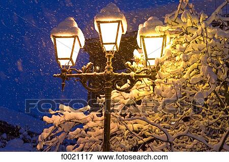 Stock Photo - France, Alps, Megeve, streetlight. Fotosearch
