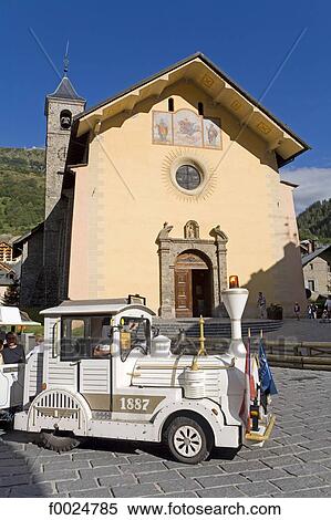 France, Alps, Valloire, church and little tourist train View Large Photo Image Stock Photography - France, Alps, Valloire, church and little tourist train. Fotosearch