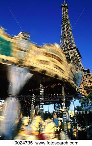 France, Paris, merry-go-round at the foot of Eiffel Tower View Large Photo Image Stock Photography - France, Paris, merry-go-round at the foot of Eiffel Tower. Fotosearch