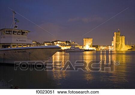 France, Poitou Charentes, La Rochelle, harbour, Saint Nicolas Tower and Tower of the Chain by night View Large Photo Image Stock Image - France, Poitou Charentes, La Rochelle, harbour, Saint Nicolas Tower and Tower of the Chain by night. Fotosearch