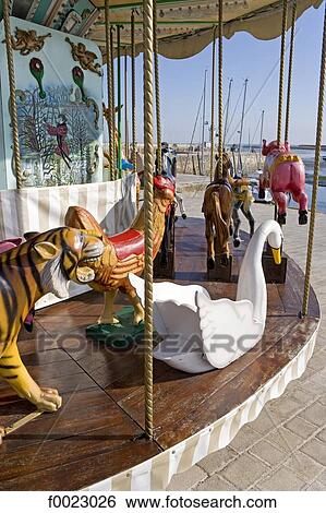 Stock Photograph - France, Poitou Charentes, Re Island, La Flotte, merry-go-round. Fotosearch