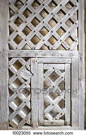 France, Poitou Charentes, Re Island, fretwork wooden door View Large Photo Image Stock Photography - France, Poitou Charentes, Re Island, fretwork wooden door. Fotosearch