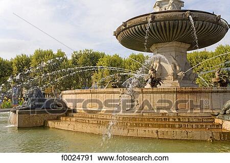 Stock Image - France, Provence, Aix-en-Provence, Rotunda fountain. Fotosearch