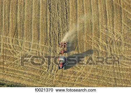 Stock Image - France, Provence, Valensole Plateau, wheat harvest, aerial view. Fotosearch