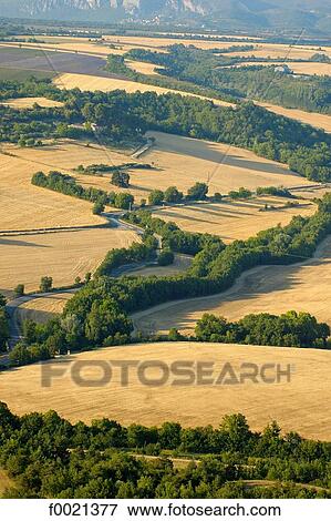France, Provence, Valensole plateau, wheat fields, aerial view View Large Photo Image Stock Photo - France, Provence, Valensole plateau, wheat fields, aerial view. Fotosearch