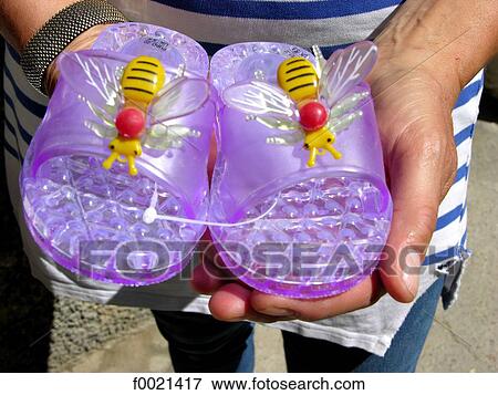 Stock Photo - France, Provence, Valensole Plateau, bees decorated shoes. Fotosearch