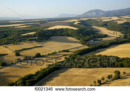 France, Provence, Valensole plateau, wheat fields, aerial view View Large Photo Image Stock Photograph - France, Provence, Valensole plateau, wheat fields, aerial view. Fotosearch