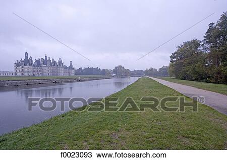 France, Touraine, Chambord, castle along the river View Large Photo Image Stock Image - France, Touraine, Chambord, castle along the river. Fotosearch