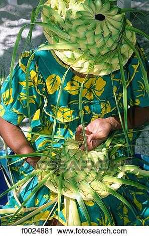 French Polynesia, Society Islands, Leeward Islands, Bora Bora, woman making hats with palm leaves View Large Photo Image Stock Image - French Polynesia, Society Islands, Leeward Islands, Bora Bora, woman making hats with palm leaves. Fotosearch