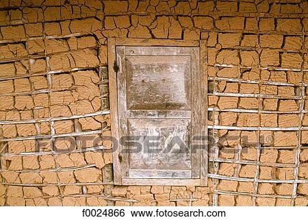 Stock Photograph - Gabon, facade of traditional dwelling. Fotosearch