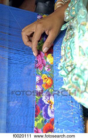 Stock Image - Guatemala, Antigua, traditional weaving. Fotosearch