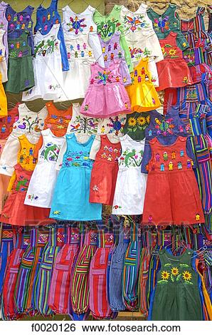 Stock Photograph - Guatemala, Chichicastenango, Indian market, multicoloured dresses. Fotosearch