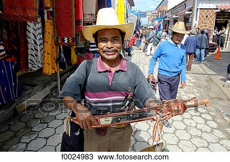 Stock Image - Guatemala, Chichicastenango, market, Indian man portrait. Fotosearch