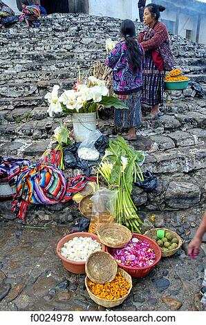 Stock Photo - Guatemala, Chichicastenango, market, local products for sale in front of the Santo Tomas church . Fotosearch