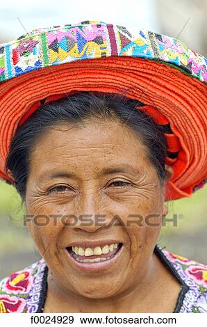 Guatemala, Santiago Atitlan, Indian woman wearing a tocoyal View Large Photo Image Stock Photo - Guatemala, Santiago Atitlan, Indian woman wearing a tocoyal. Fotosearch