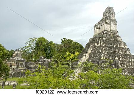 Stock Image - Guatemala, Tikal, pyramid of the Temple of the Jaguar. Fotosearch