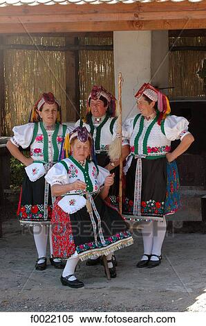Hungary, Hollokö, women wearing traditional costume View Large Photo Image Stock Photography - Hungary, Hollokö, women wearing traditional costume. Fotosearch