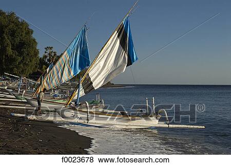 Stock Photo - Indonesia, Bali, Amed, traditional fishing boats. Fotosearch