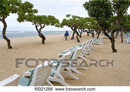 Indonesia, Bali, deckchairs on the beach View Large Photo Image Stock Photograph - Indonesia, Bali, deckchairs on the beach. Fotosearch
