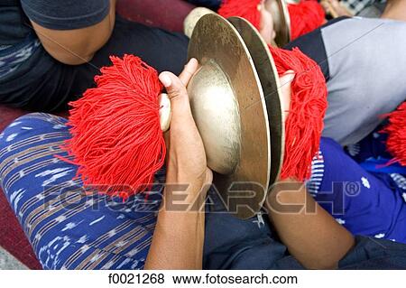 Indonesia, Bali, Denpensar, cremation ceremony of a brahman lady, musical instrument View Large Photo Image Stock Photo - Indonesia, Bali, Denpensar, cremation ceremony of a brahman lady, musical instrument. Fotosearch