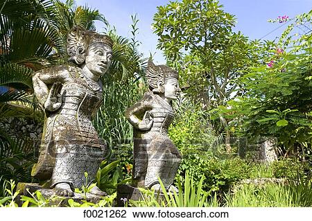 Stock Image - Indonesia, Bali, Jimbaran, luxury hotel Four-seasons, statue. Fotosearch