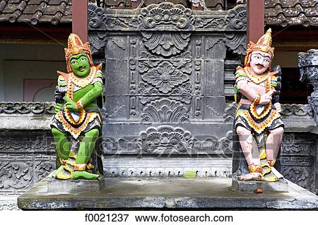 Indonesia, Bali, little statues at a temple's entrance View Large Photo Image Stock Photo - Indonesia, Bali, little statues at a temple's entrance. Fotosearch