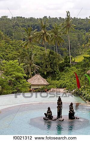 Stock Image - Indonesia, Bali, swimming pool of a luxury hotel. Fotosearch