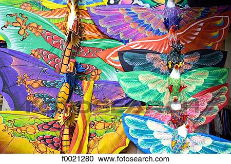 Stock Image - Indonesia, Bali, Ubud, kites for sale on the market. Fotosearch