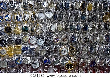 Stock Image - Indonesia, Bali, Ubud, watches for sale on the market. Fotosearch