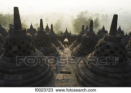 Stock Image - Indonesia, Java, Borobudur Temple, stupas. Fotosearch