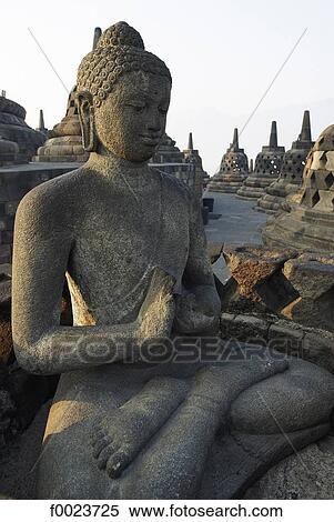 Indonesia, Java, Borobudur Temple, statue of Buddha View Large Photo Image Stock Photography - Indonesia, Java, Borobudur Temple, statue of Buddha. Fotosearch