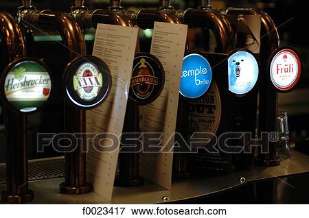 Irelande, Dublin, pub, beer pumps View Large Photo Image Stock Photo - Irelande, Dublin, pub, beer pumps. Fotosearch