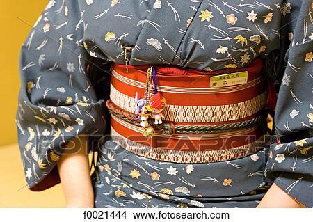 Japan, island of Kyushu, Ibusuki, Hakusuikan Hotel, hostess wearing traditional costume View Large Photo Image Picture - Japan, island of Kyushu, Ibusuki, Hakusuikan Hotel, hostess wearing traditional costume. Fotosearch