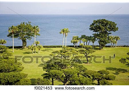 Stock Image - Japan, island of Kyushu, Ibusuki, Hakusuikan Hotel, seashore garden. Fotosearch