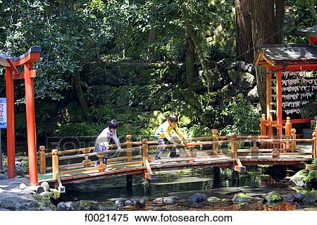 Stock Photography - Japan, island of Kyushu, Ibusuki, playing children. Fotosearch