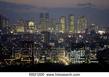 Stock Image - Japan, Tokyo, Ginza and Shinjuku quarters by night. Fotosearch