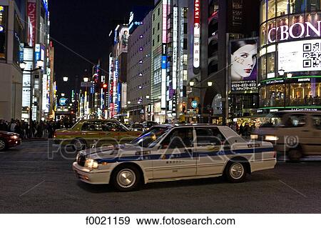 Japan, Tokyo, Ginza quarter by night View Large Photo Image Stock Photo - Japan, Tokyo, Ginza quarter by night. Fotosearch