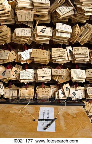 Stock Photo - Japan, Tokyo, Meiji shintoist shrine, wooden votive offerings. Fotosearch
