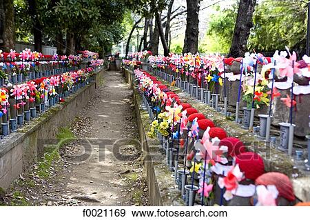 Stock Photo - Japan, Tokyo, Shiba quarter, Temple of Zojoji park, steles for dead children. Fotosearch