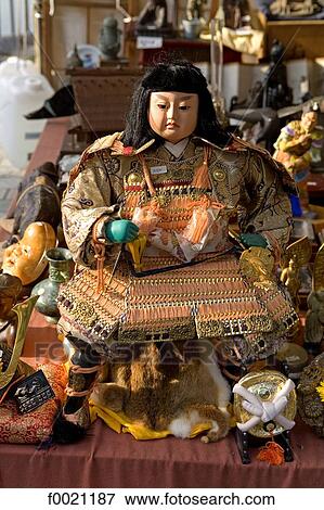 Stock Photo - Japan, Tokyo, Ueno Park, statuette on sale at the market. Fotosearch