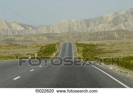 Kyrgyzstan, between Osh and Bishkek, road View Large Photo Image Stock Image - Kyrgyzstan, between Osh and Bishkek, road. Fotosearch