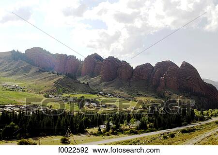 Kyrgyzstan, Jeti-Oguz, red sandstone cliffs View Large Photo Image Stock Image - Kyrgyzstan, Jeti-Oguz, red sandstone cliffs. Fotosearch