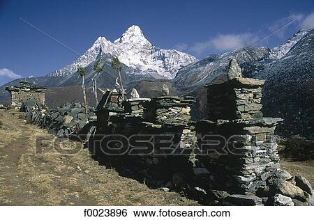 Nepal, near Pangboche, Ama Dablam and mani wall View Large Photo Image Stock Photograph - Nepal, near Pangboche, Ama Dablam and mani wall. Fotosearch