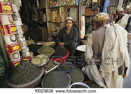Pakistan, North-West Frontier Province, Peshawar, old city bazaar, merchant View Large Photo Image Stock Photo - Pakistan, North-West Frontier Province, Peshawar, old city bazaar, merchant. Fotosearch