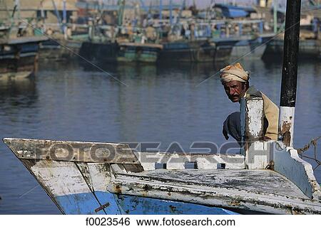 Pakistan, Sindh, Karachi, fishing port, fisherman and boat View Large Photo Image Stock Photograph - Pakistan, Sindh, Karachi, fishing port, fisherman and boat. Fotosearch